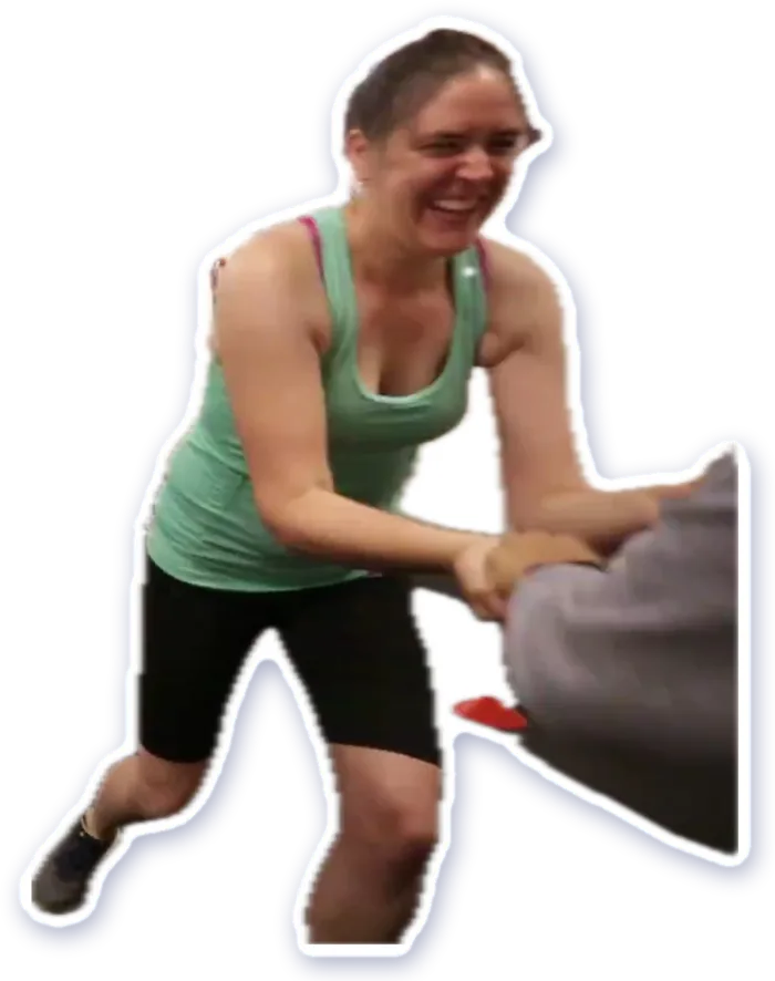 A member laughing through a partner conditioning drill