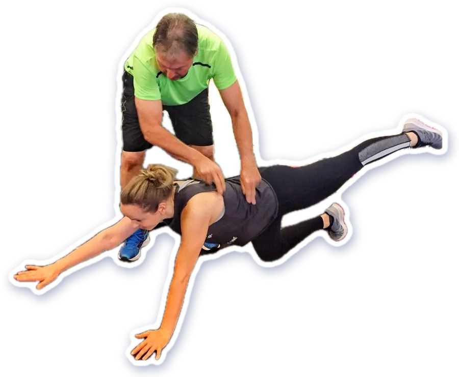 A trainer guiding a member through a stretch