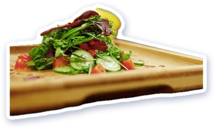 A fresh salad on a wooden board
